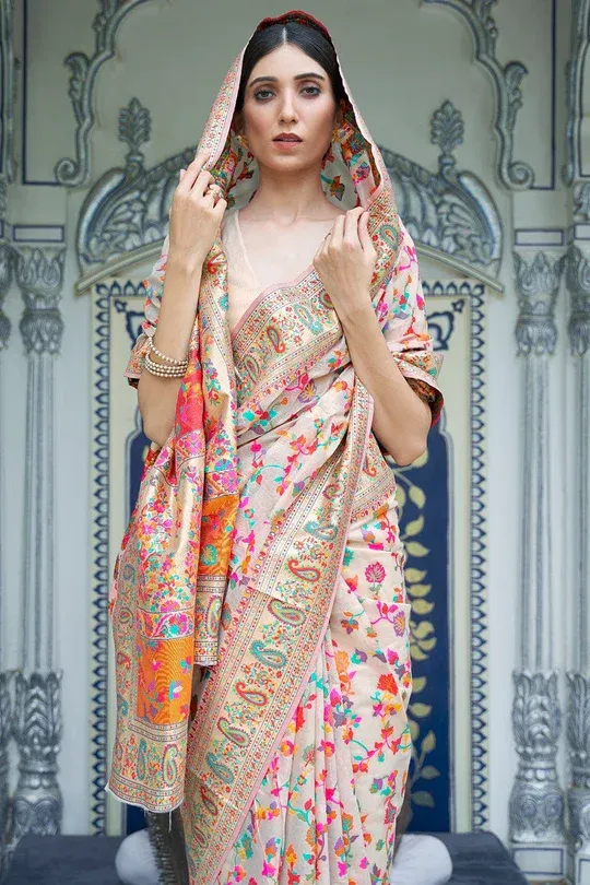 Adorning Beige Pashmina saree With Nectarous Blouse Piece