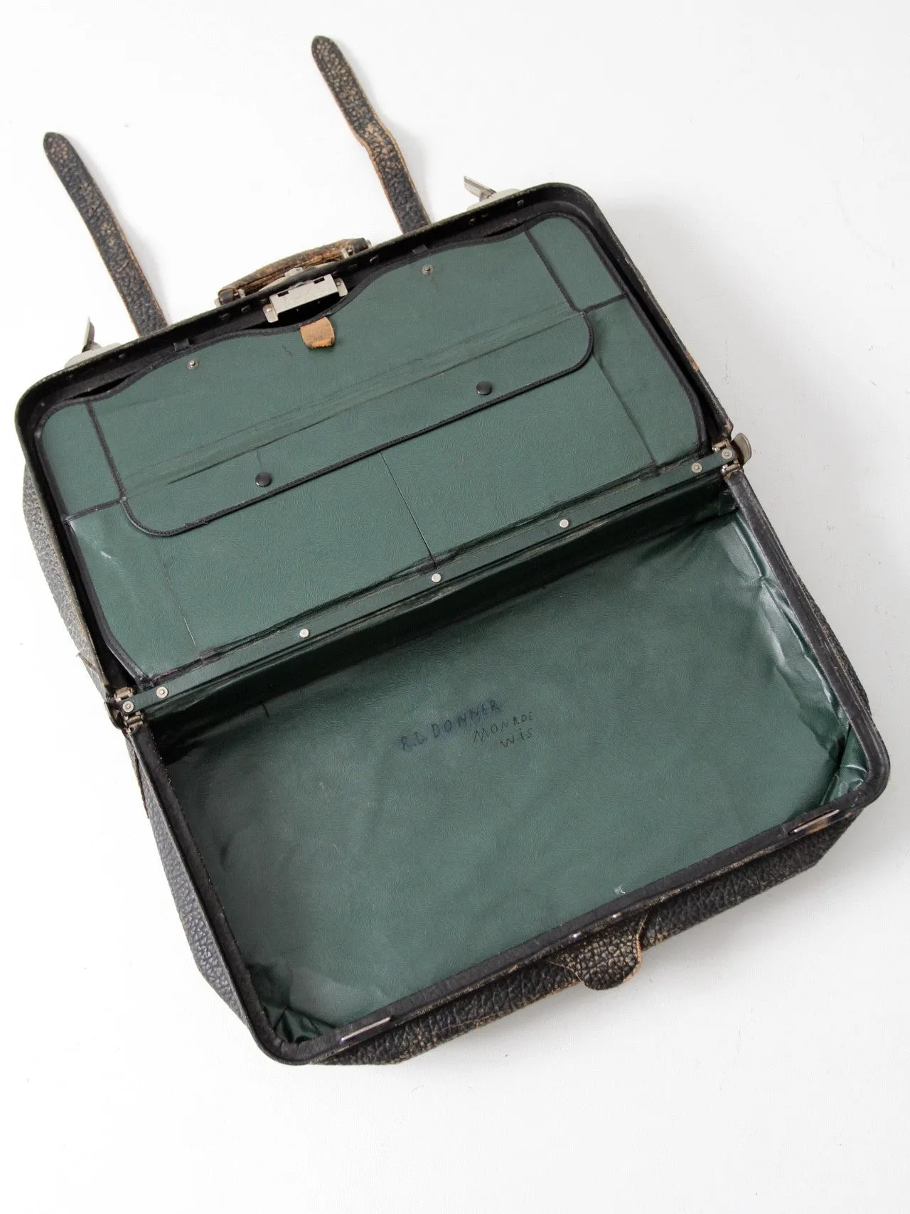 black leather suitcase circa 1930