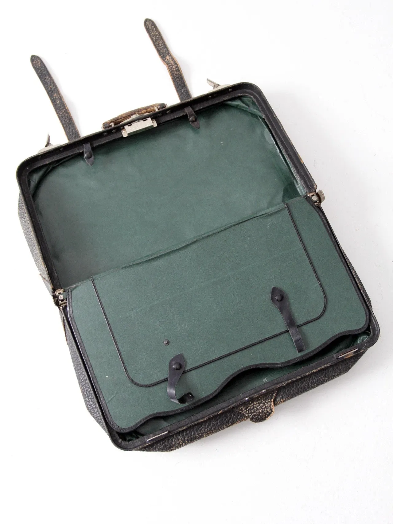 black leather suitcase circa 1930