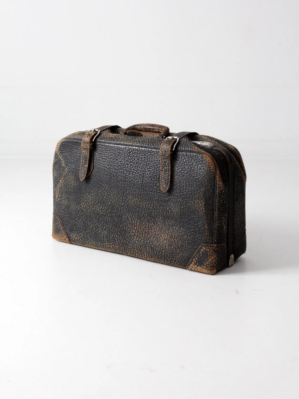 black leather suitcase circa 1930