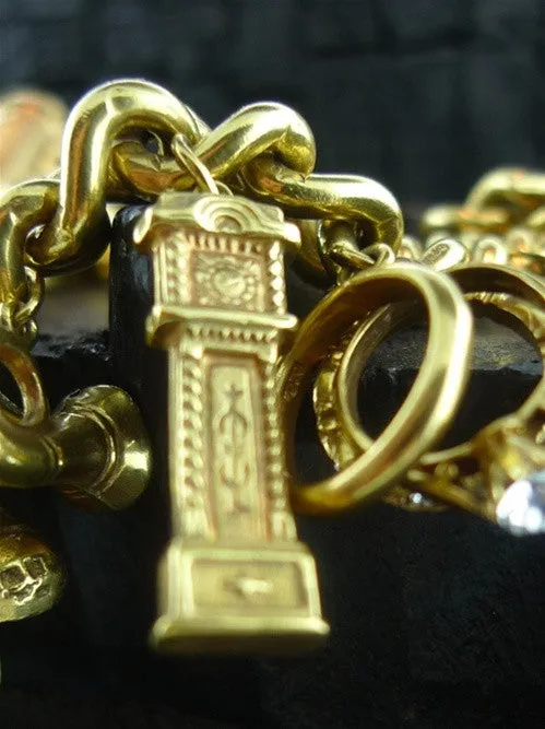 Heavy and Resplendent Vintage Estate Charm Bracelet in 14K Yellow Gold