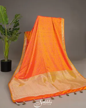 Sunset orange banarasi mashru silk saree with blouse